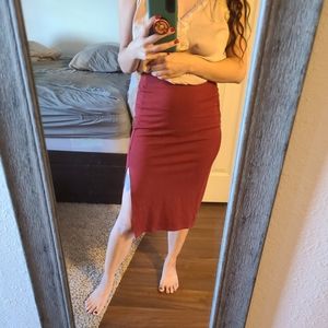 Burgundy pencil skirt with a slit